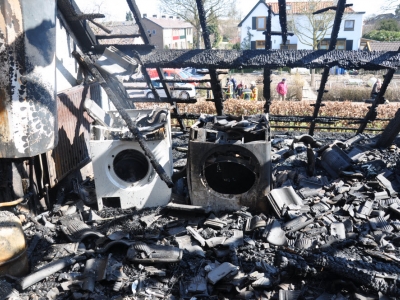 Wasmachine vliegt in brand in Papa Beer Harderwijk